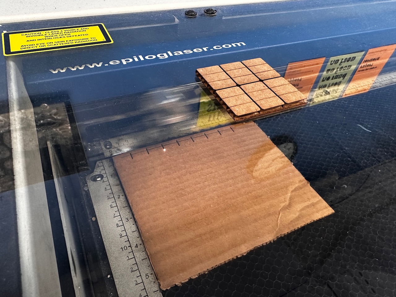 Laser cutter engraving cardboard